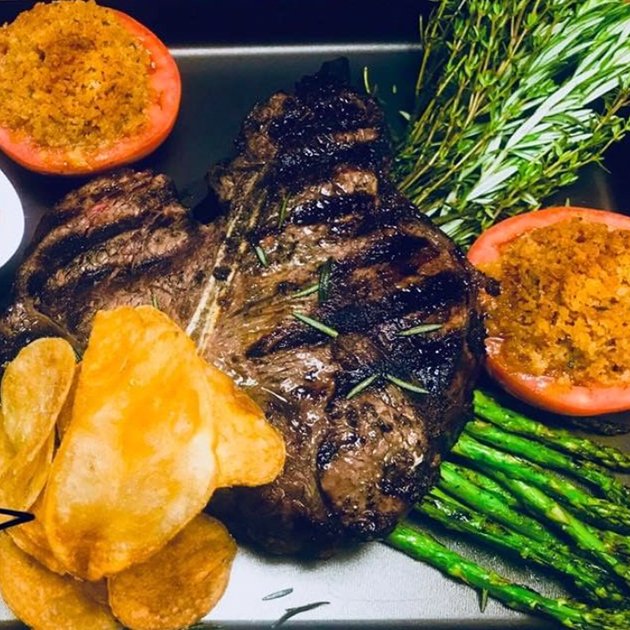 Porterhouse steak with assorted veggies