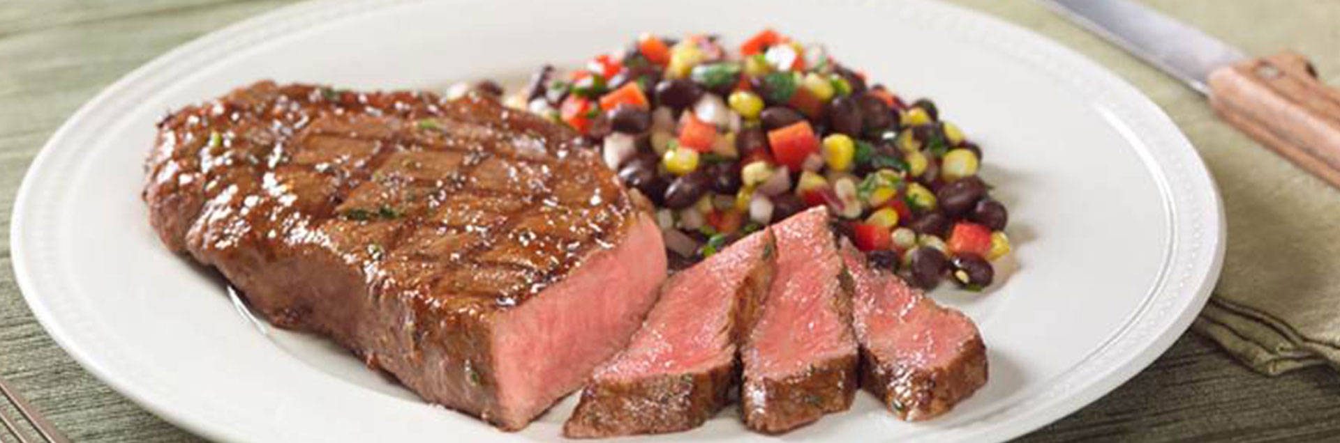 Sizzling NY Strip Steaks